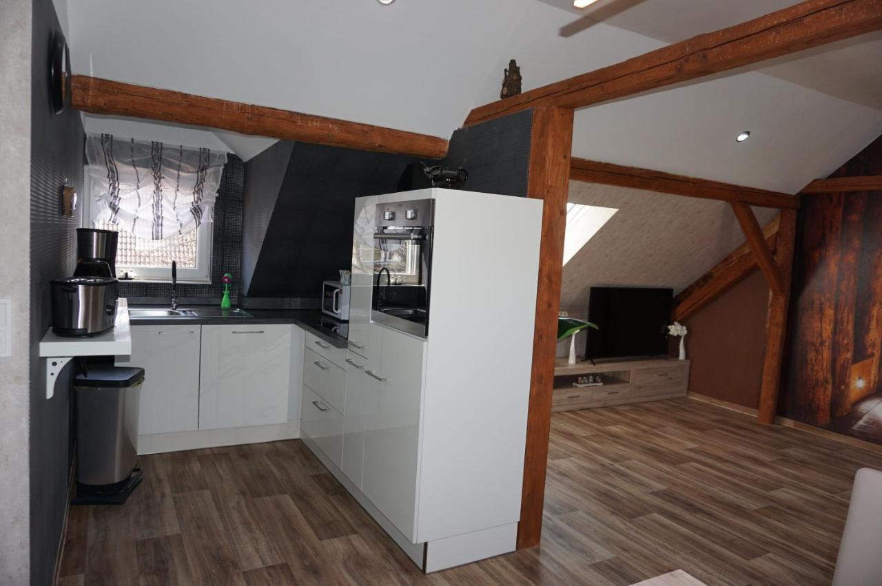 Aussergewoehnliche Dachgeschosswohnung เคอนิกสลูทเทอร์ อัม เอล์ม ภายนอก รูปภาพ